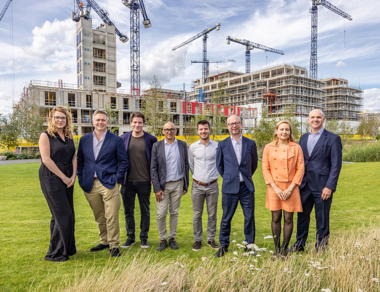 Pictured left to right, with the emerging Brent Cross Town in the background, are Bryony Harrap and Max Cawthorn - PIC; Oli Rifkind, André Gibbs and Simon Beck - Related Argent; Kevin Beirne and Mathilde Guittard - Octopus Real Estate; and John Nettleton, Audley Group.